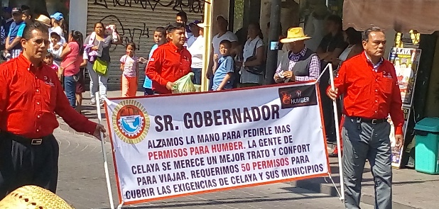 Desfilan 7 mil, piden seguridad, transporte e IMSS